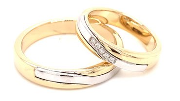 Fedi in oro bianco e giallo con brillanti